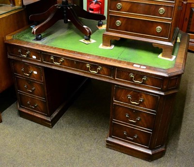 Lot 1296 - A reproduction mahogany leather top pedestal desk