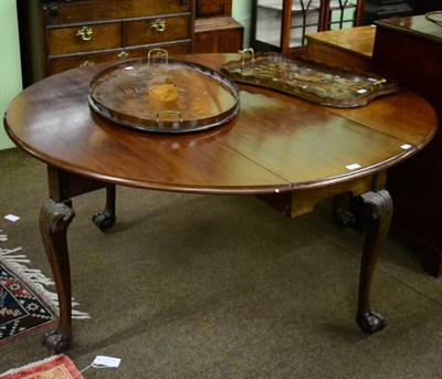 Lot 1326 - A 19th century mahogany drop leaf table