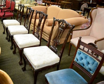 Lot 1337 - Four 18th century style carved dining chairs and a late Victorian single dining chair (5)