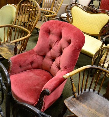 Lot 1347 - A late Victorian mahogany framed button back bedroom armchair and a spindle back Windsor...