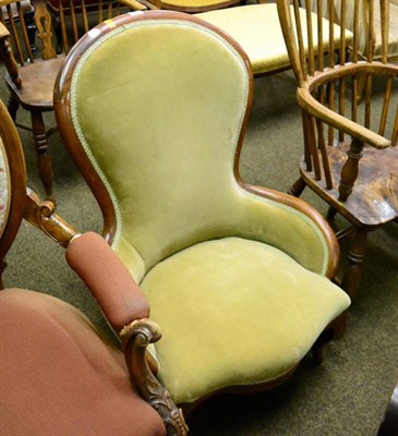 Lot 1348 - A Victorian walnut nursing chair