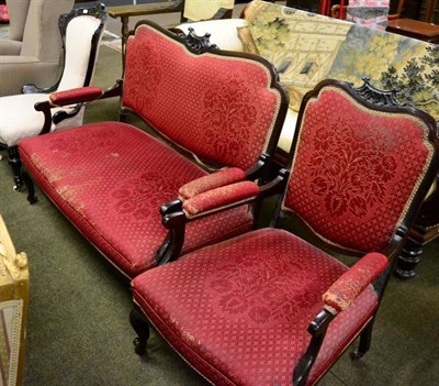 Lot 1353 - A carved and upholstered settee and matching armchair