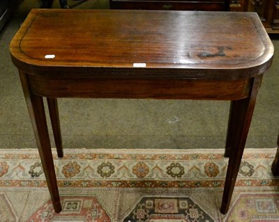 Lot 1359 - George III mahogany fold over tea table