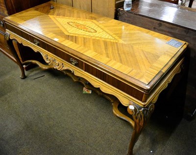 Lot 1369 - A 20th century walnut, crossbanded and marquetry inlaid serving table, possibly American, in George