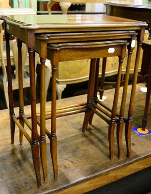 Lot 1372 - A nest of three mahogany inlaid tables