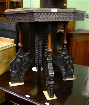 Lot 1382 - An Indian carved octagonal shaped centre table