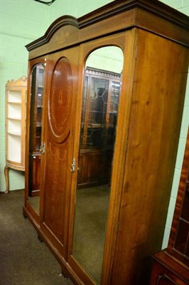 Lot 1387 - An Edwardian mahogany inlaid triple wardrobe