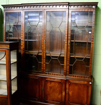 Lot 1388 - A George III style glazed breakfront bookcase (en suite to lot 1380)