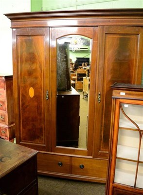 Lot 1389 - An early 20th century mahogany inlaid triple wardrobe