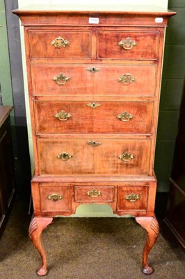 Lot 1390 - An early 20th century walnut chest on stand with cabriole legs and shell carved knees