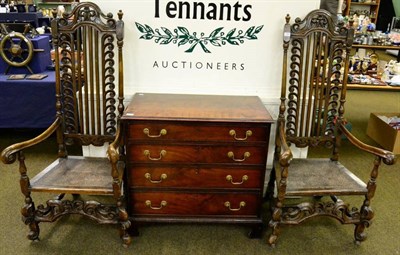 Lot 1407 - A pair of 17th century style walnut armchairs, with scrolled top rails above outswept arms with...