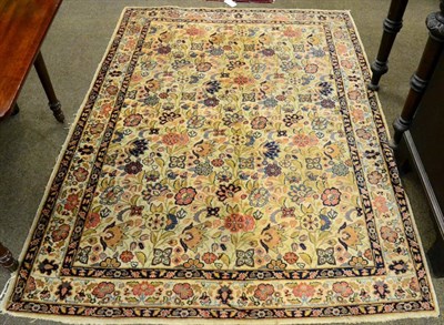 Lot 1421 - Tabriz Rug, Iranian Azerbaijan, the field with a one-way design of flowering plants enclosed by...