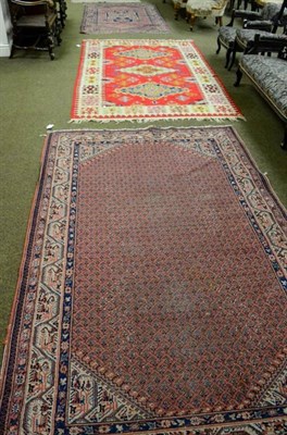 Lot 1424 - Thrace Kilim, European Turkey, the pillar box red field with three hooked medallions enclosed...