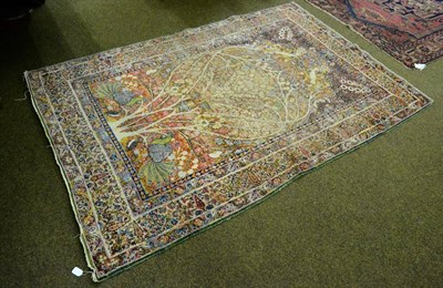 Lot 1425 - A multi-coloured floral decorated rug