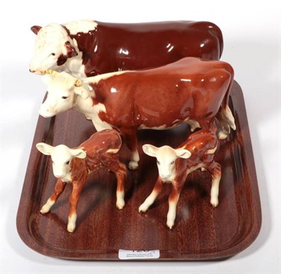 Lot 126 - Beswick Cattle Comprising: Hereford Cow, Second Version - Horns point forward, model No. 948,...