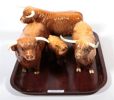 Lot 127 - Beswick Cattle Comprising: Highland Bull, model No. 2008, Another, Highland Cow, model No. 1740 and