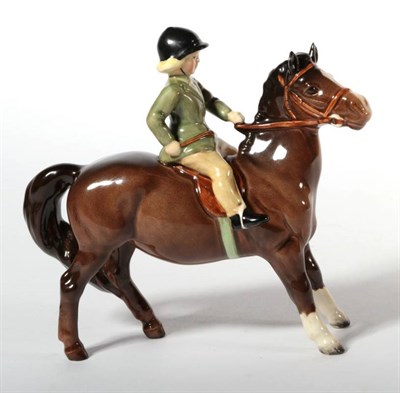 Lot 138 - Beswick Girl on Pony, model No. 1499, brown gloss (a.f)