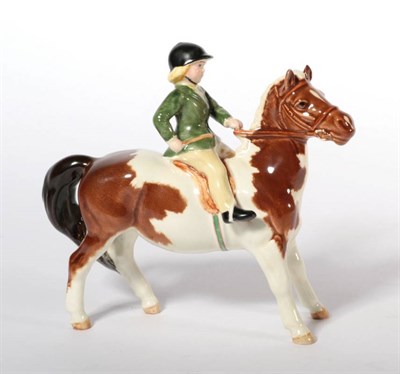 Lot 140 - Beswick Girl on Pony, model No. 1499, Skewbald gloss