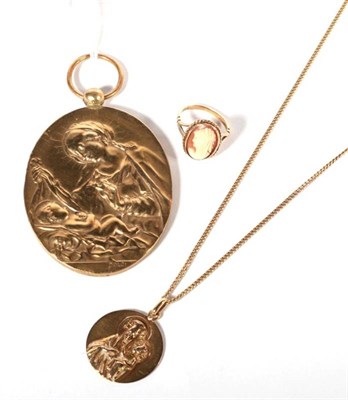 Lot 213 - A 9 carat gold cameo ring and a Madonna and child pendant on chain, 12.8g gross; and a bronze...