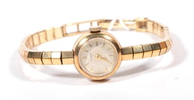 Lot 219 - A 9 carat gold Tissot wristwatch, on a 9 carat gold bracelet strap, 16.7g gross