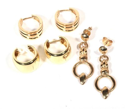 Lot 273 - Three pairs of 9 carat gold earrings, comprising two pairs of hoop earrings and a pair of drop...
