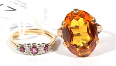 Lot 277 - A 9 carat gold citrine ring, finger size P1/2 and a 9 carat gold ruby and diamond ring, finger size