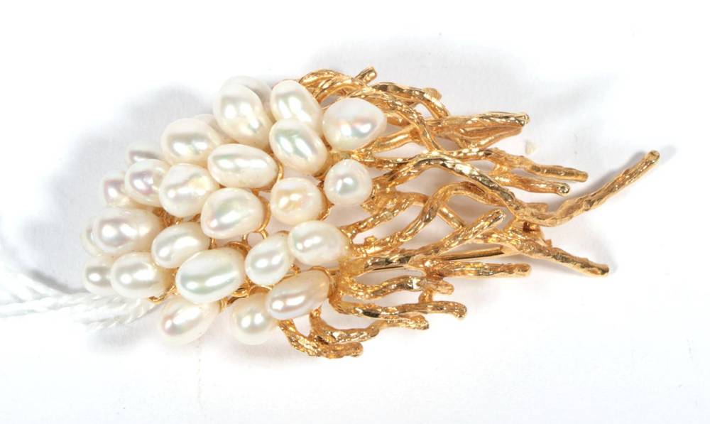 Lot 283 - A cultured pearl spray brooch, a cluster of baroque cultured pearls to textured tendrils,...