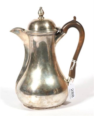 Lot 288 - ~ A late Victorian silver hot water jug, by Barraclough & Sons, London, 1896, plain baluster...