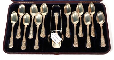 Lot 301 - ~ A matched set of twelve Victorian large teaspoons, tongs and a shovel, Messrs Lias, London,...