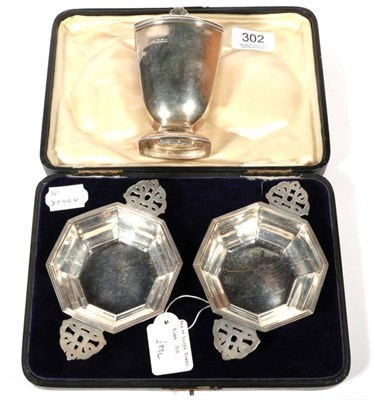 Lot 302 - ~ An Art Deco silver caster, by Brook & Son, Sheffield, 1934, 5.2ozt; and a pair of twin -...