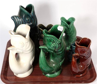 Lot 310 - ~ A collection of seven Dartmouth glug jugs (7)
