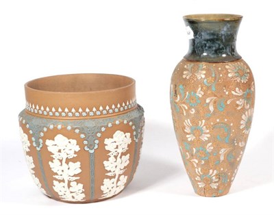 Lot 314 - ~ A Doulton Lambeth green glazed and floral decorated vase, 28cm high; and a Doulton stoneware...
