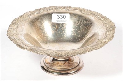 Lot 330 - ~ An Edwardian silver pedestal bowl, by Goldsmiths & Silversmiths, London, 1902, with foliate...