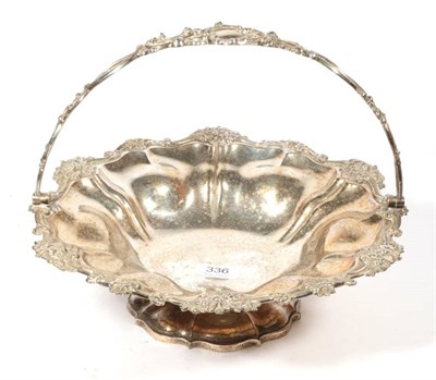 Lot 336 - ~ A William IV silver swing-handled basket, Messrs Barnard, London, 1835, with foliate border...