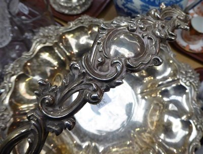 Lot 336 - ~ A William IV silver swing-handled basket, Messrs Barnard, London, 1835, with foliate border...