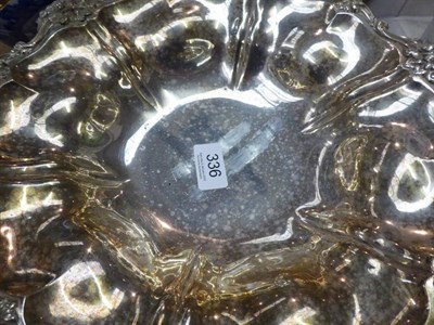 Lot 336 - ~ A William IV silver swing-handled basket, Messrs Barnard, London, 1835, with foliate border...