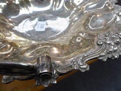 Lot 336 - ~ A William IV silver swing-handled basket, Messrs Barnard, London, 1835, with foliate border...