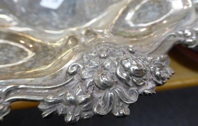 Lot 336 - ~ A William IV silver swing-handled basket, Messrs Barnard, London, 1835, with foliate border...