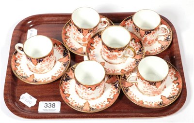 Lot 338 - Six Royal Crown Derby gilt decorated coffee cans and saucers