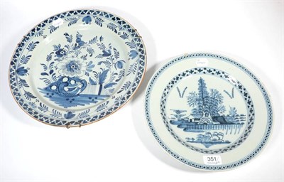 Lot 351 - An 18th century tin glazed Delft blue and white dish, 35cm diameter; and a smaller 18th century...