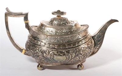Lot 356 - ~ A George III silver teapot, maker indistinct, London, 1817, oval on ball supports, 23.6ozt