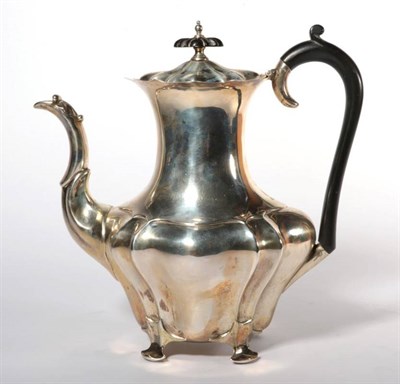 Lot 357 - ~ An Edwardian silver coffee pot, Walker & Hall, Sheffield, 1904, shaped oval baluster form,...