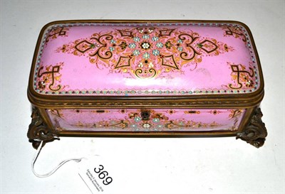 Lot 369 - A 19th century French pink enamel and floral decorated jewellery casket, 21cm diameter