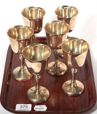 Lot 375 - A set of six silver goblets, Birmingham assay