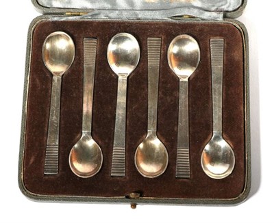 Lot 378 - A set of six Georg Jensen silver Parallel pattern coffee spoons, English import marks for...