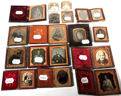 Lot 379 - A collection of twelve various Victorian Daguerrotypes and Ambrotypes of women, some cased;...