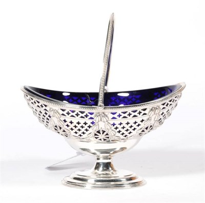 Lot 381 - A late Victorian silver swing handled sugar basket of George III style, Thomas Bradbury, London...