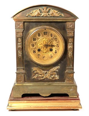 Lot 409 - A brass mantel clock and stand