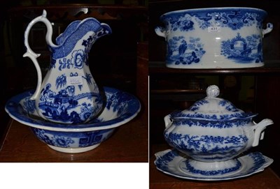 Lot 431 - A flow blue footbath; together with a soup tureen, jug and bowl in Canton pattern