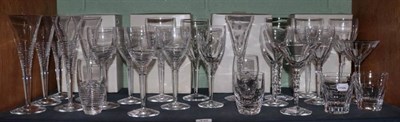 Lot 446 - A group of Jasper Conran Stuart Crystal Strata Pattern table glass comprising: five champagne...